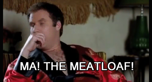 a man in a robe is sitting on a couch and saying `` ma ! the meat loaf '' .