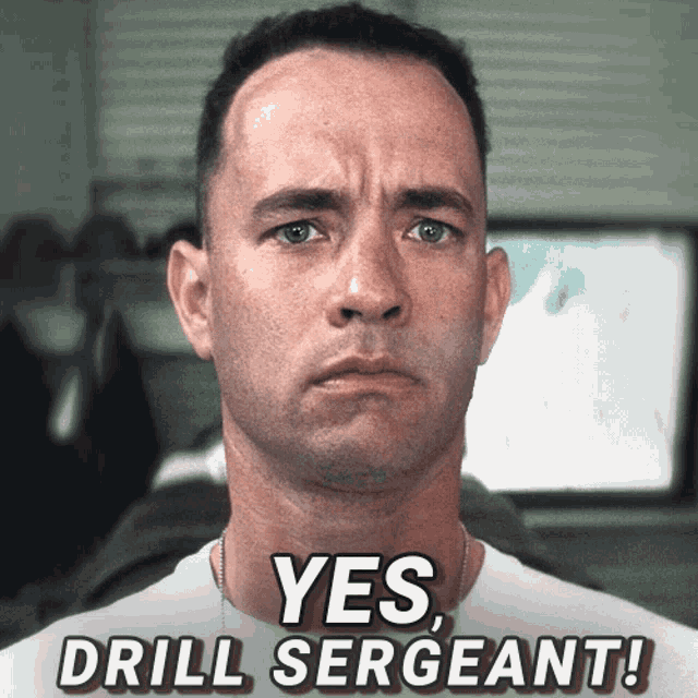 a close up of a man with the words yes drill sergeant on the bottom