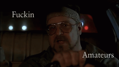 a man wearing sunglasses is driving a car and the words amateurs are on the bottom